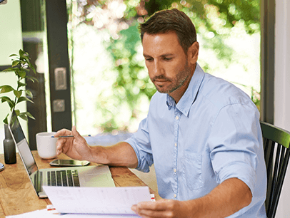 Man sitting at a table planning