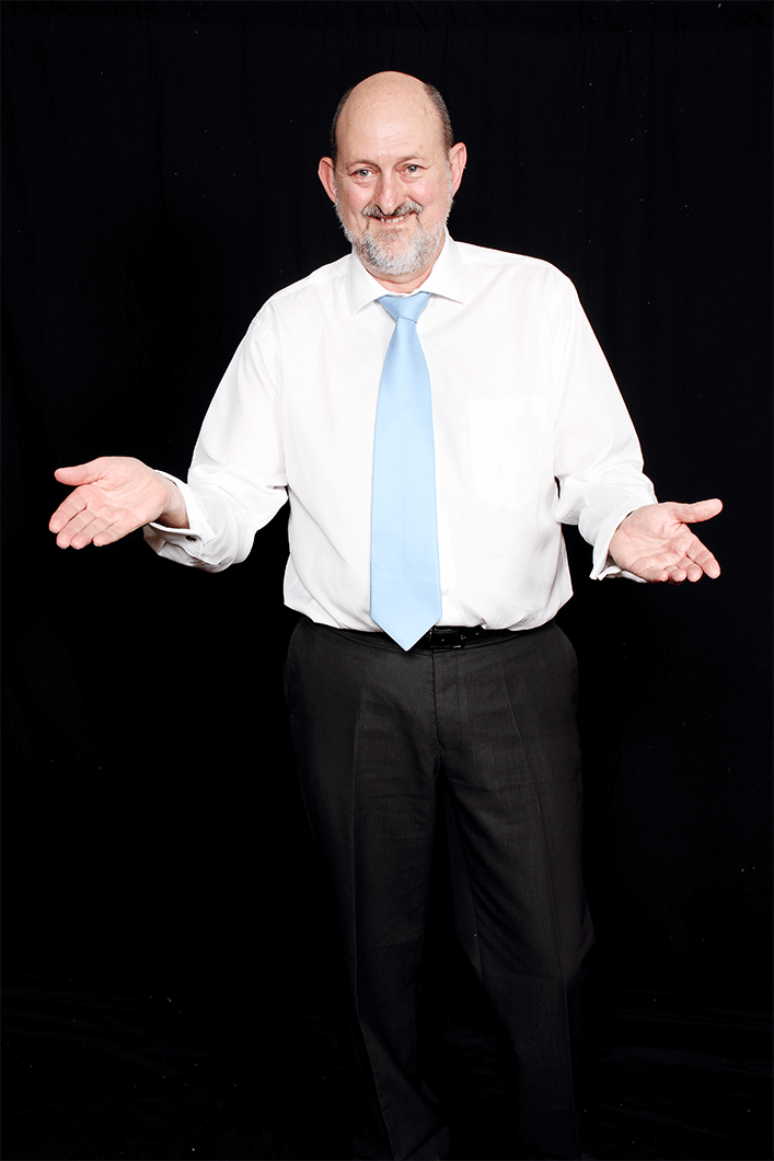 Toastmaster Peter Dhu strikes a pose for the camera. Dhu was an elective mute for 10 years due to a bad stutter, but is now a professional speaker.
