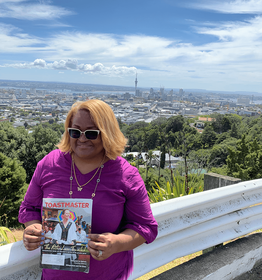 Kim Dixon of View Park, California, takes in the view from the top of Mount Eden Volcano in Auckland, New Zealand.