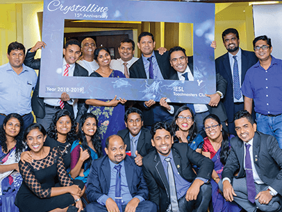 Group of Toastmasters in Sri Lanka pose with sign