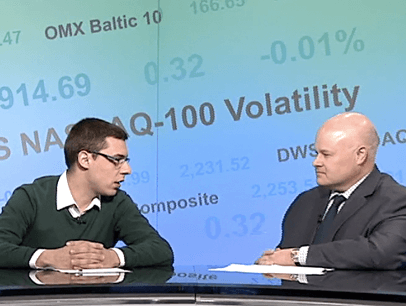Two men talking on television show