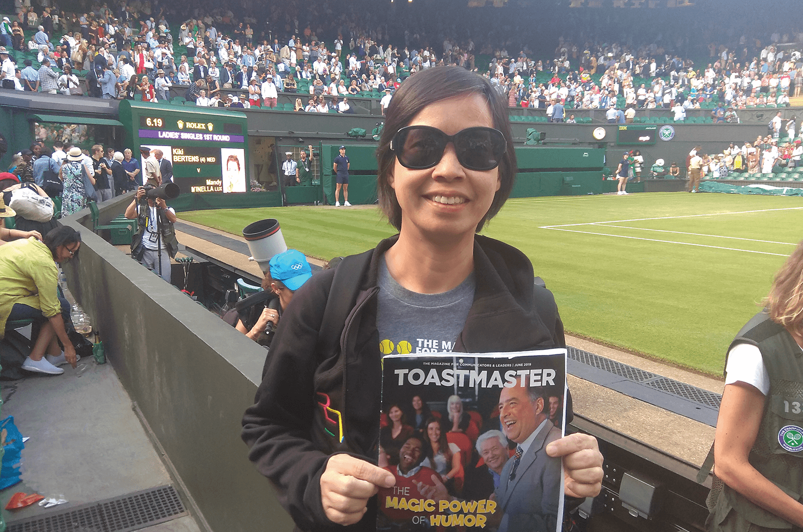 Olivia Tam of Mountain View, California, watches a tennis match in London, England, at Wimbledon, the oldest tennis tournament in the world.