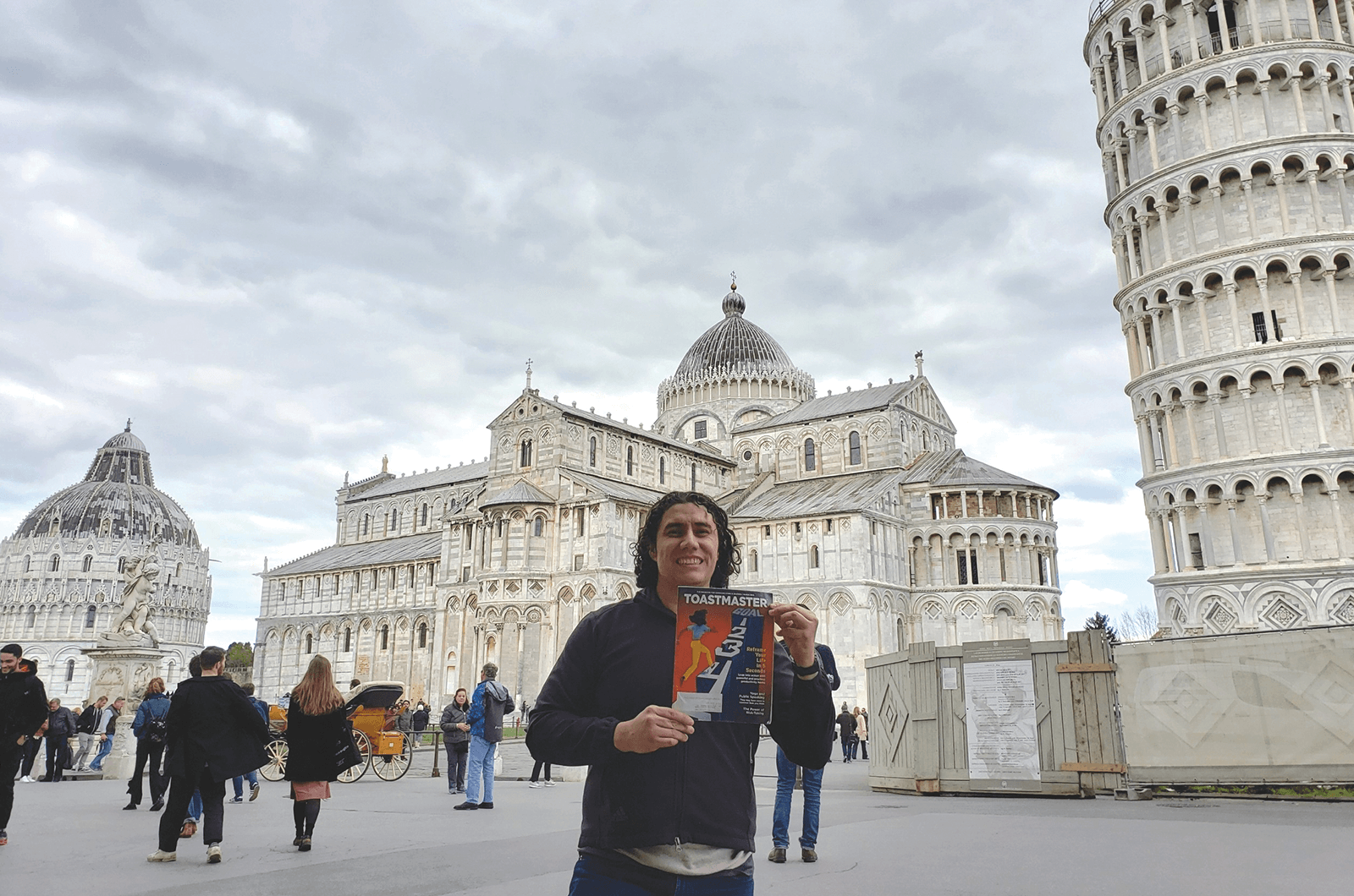 Angel Omar Sandval of Mesa, Arizona, stands in front of the Leaning Tower of Pisa and Piazza dei Miracoli in Pisa, Italy.
