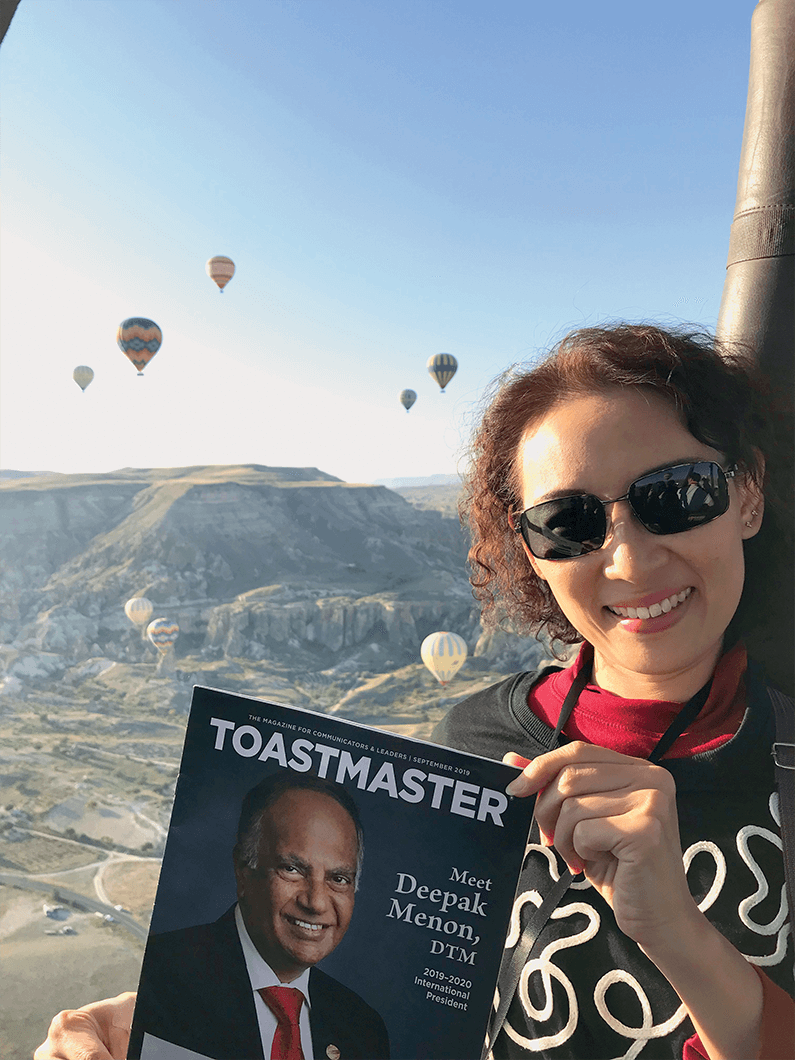 Koh Lay Hoon, DTM, of Singapore, takes her Toastmaster magazine on a hot air balloon ride in Cappadocia, Turkey.