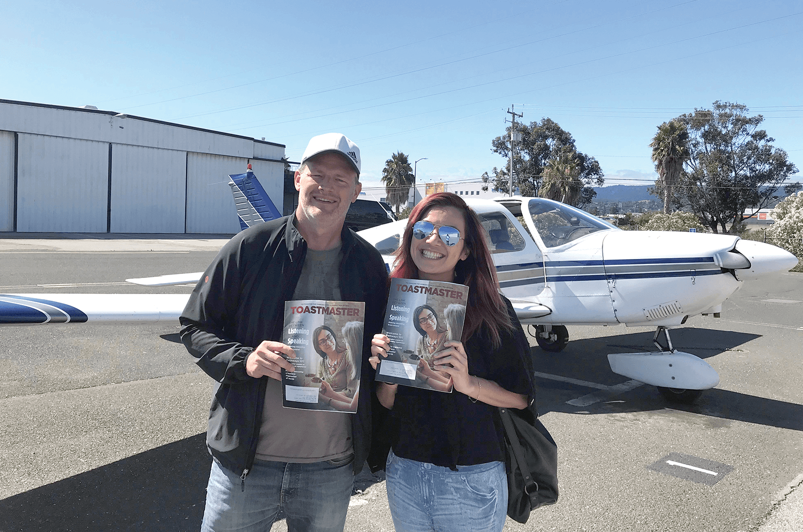 Nathan Mellin, DTM, takes fellow club member Karena Yim, both of San Francisco, California, for a flight around the area.