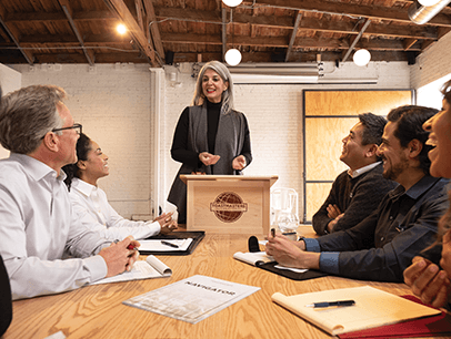 Woman standing at lectern speaking