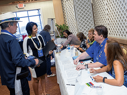 People checking in to conference