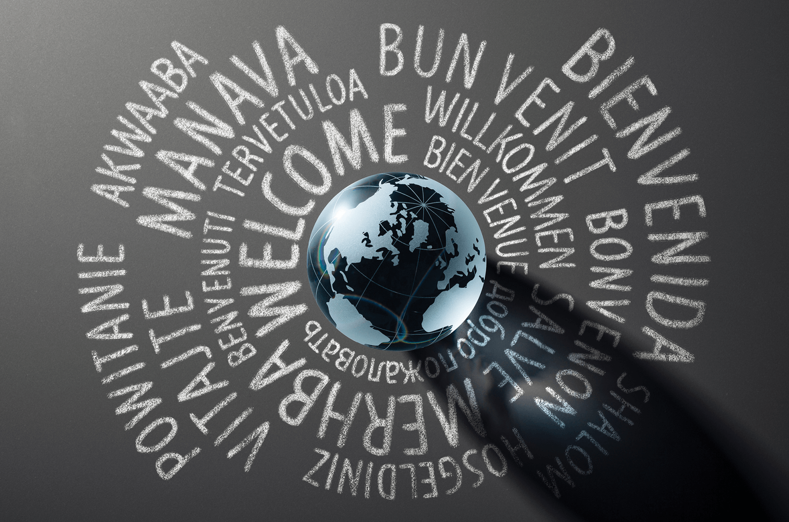 Globe with different languages written around it