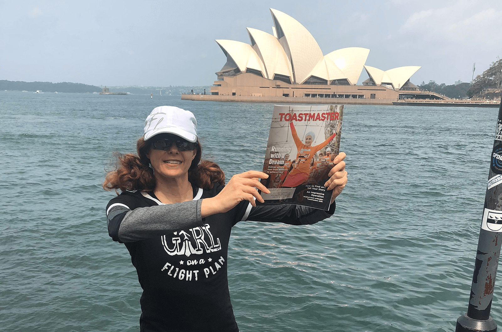 Louisa King of Fort Lauderdale, Florida, stands in front of the Sydney Opera House in Sydney, Australia.