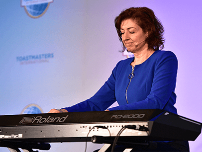 Yelena Balabanova onstage in blue dress