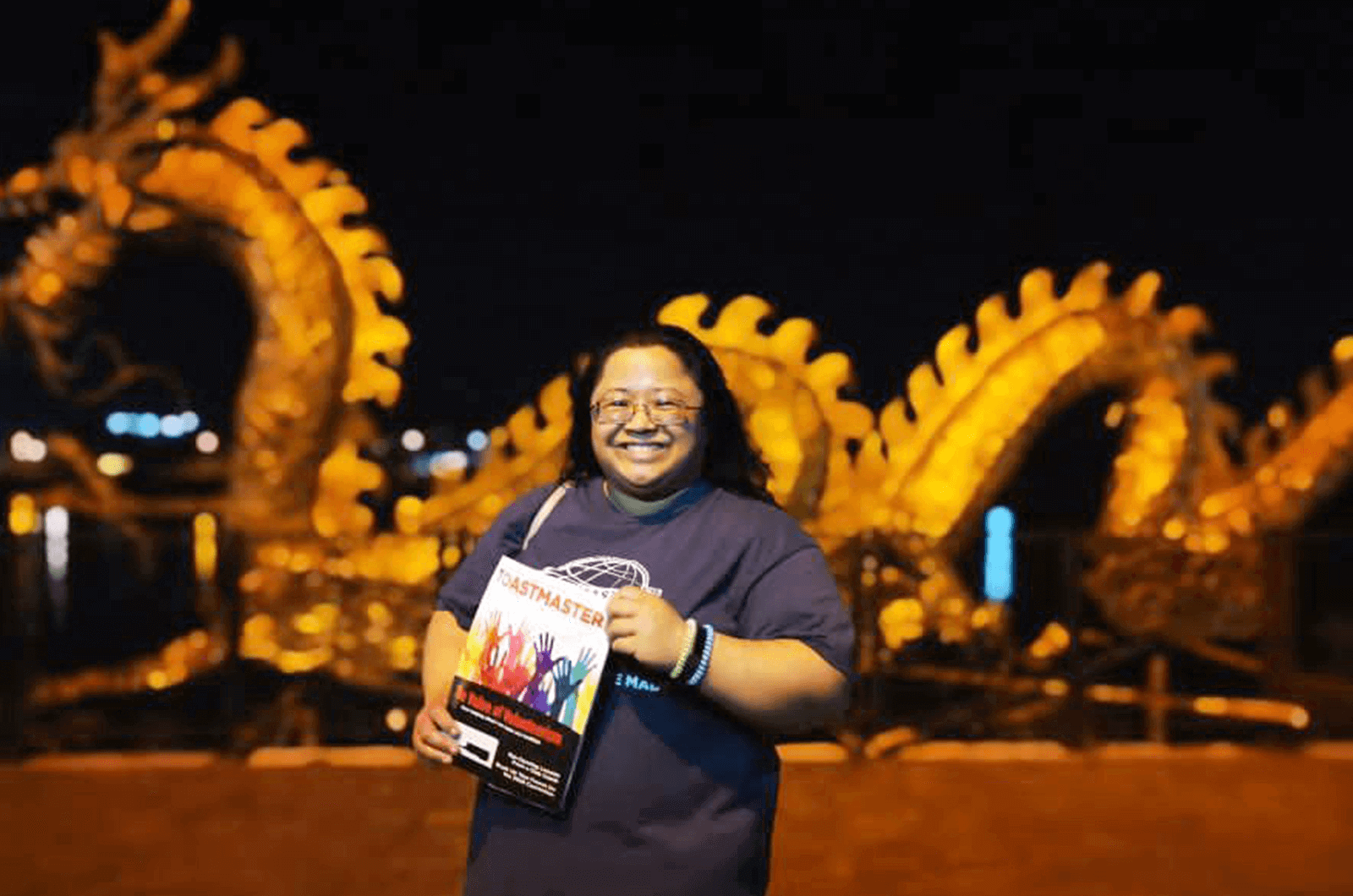 Ann Guintivano, DTM, of Carson, California, U.S., stands in front of an art installation celebrating the Chinese New Year in Iloilo City, Panay Island, Philippines.