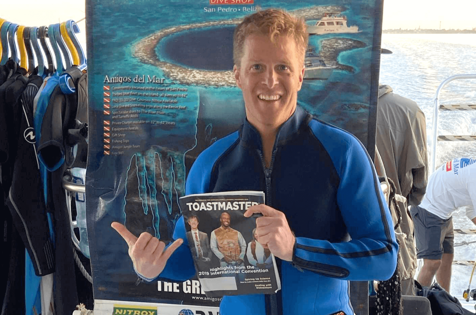 Brad Smart, DTM, of Regina, Saskatchewan, Canada, prepares to scuba dive in the Great Blue Hole—a giant marine sinkhole off the coast of Belize.