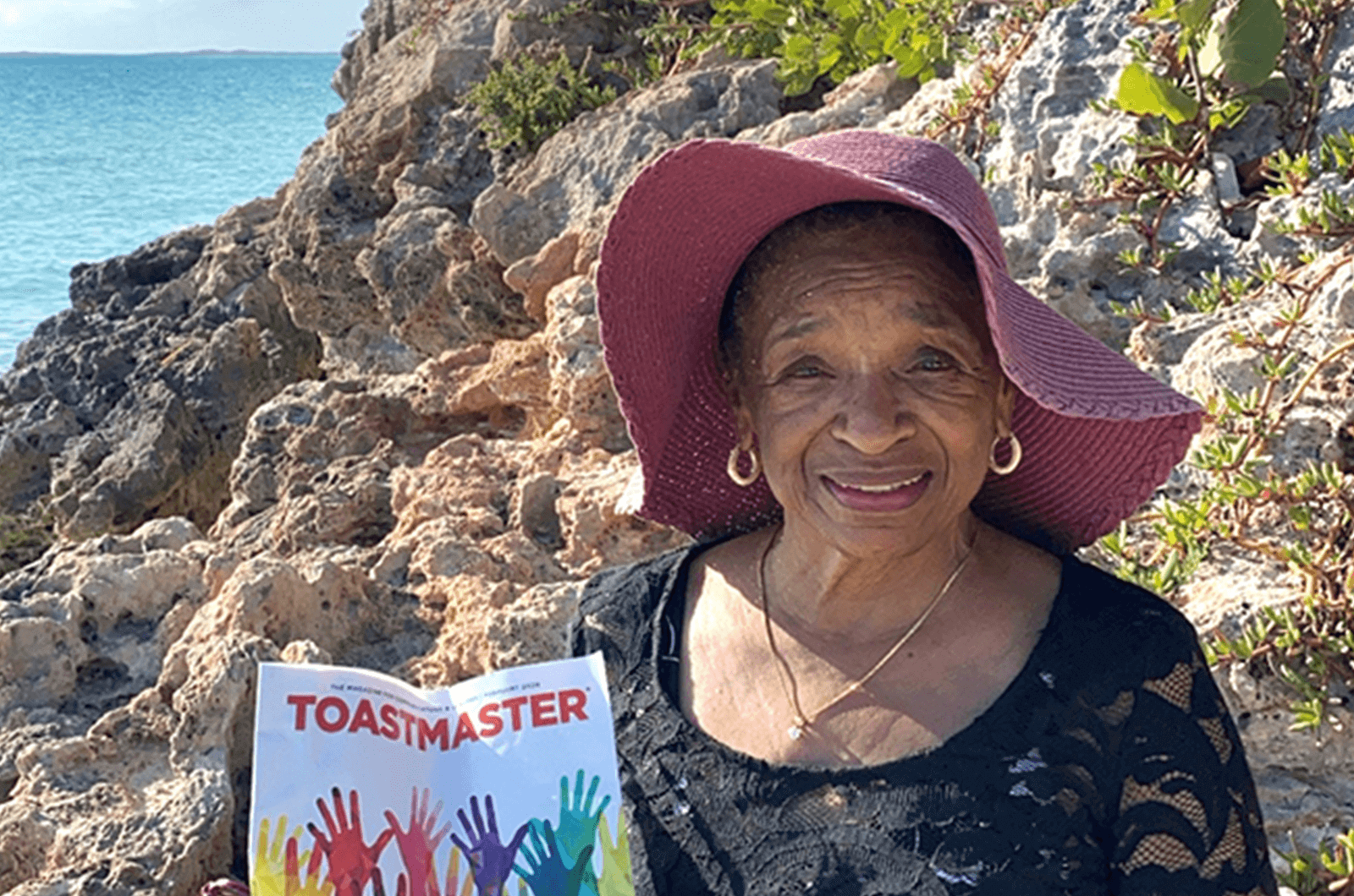 Lauretta J. Jaysura, DTM, of Bronx, New York, enjoys Grace Beach Bay on an island in Turks and Caicos.