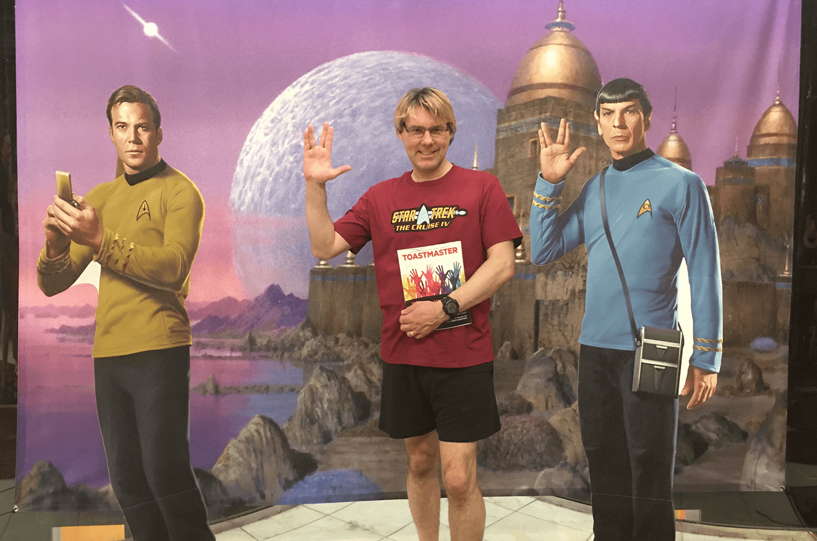 Hayden Jones of Toronto, Ontario, Canada, holds up a hand sign to represent the phrase “Live long and prosper,” from the deck of a Star Trek-themed cruise.