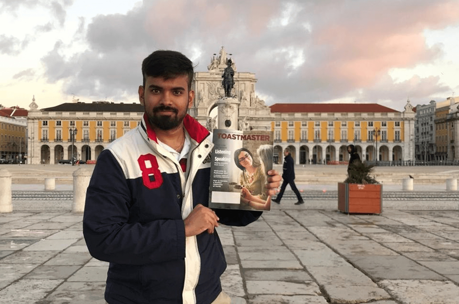 Veera Raghavendra Sriram of Waltham, Massachusetts, U.S., poses with his magazine in Lisbon, Portugal.
