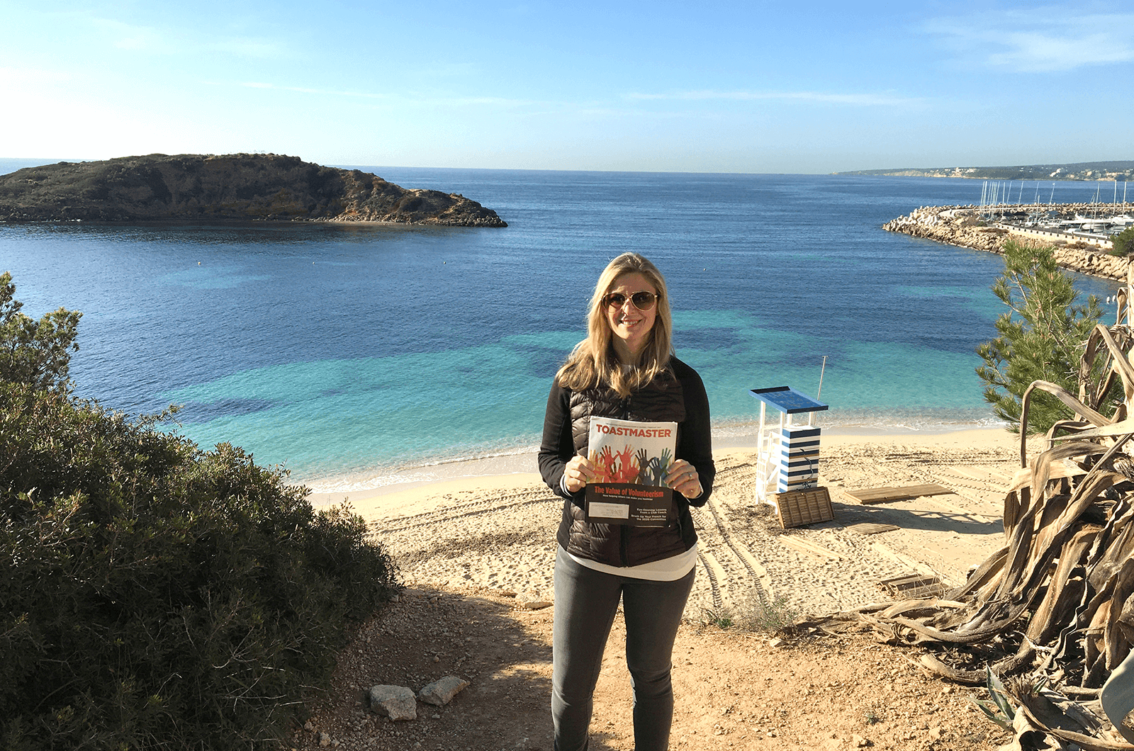 Ildiko Geuss of Anchorage, Alaska, U.S., stands on a beach in Mallorca, Spain—the largest island in the Balearic Islands.