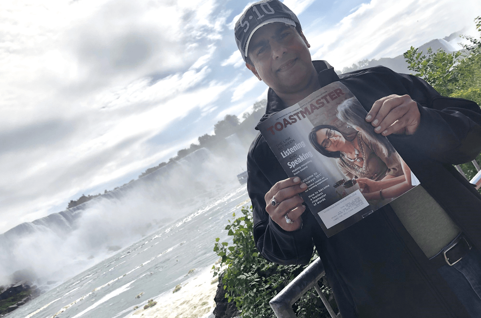 Somesh Chablani, DTM, of Edison, New Jersey, U.S., stands in front of Niagara Falls on the American-Canadian border.