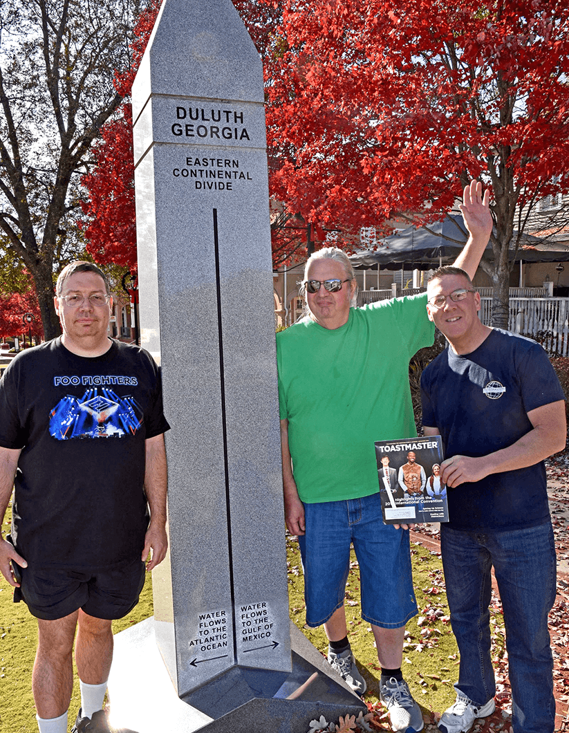 David Gilman, Sam Mercurio, and Tom Weber, DTM, of Waltham, Massachusetts, took a road trip to St. Augustine, Florida, U.S. Along the way, they stopped in Duluth, Georgia, to take a picture with the Eastern Continental Divide monument.