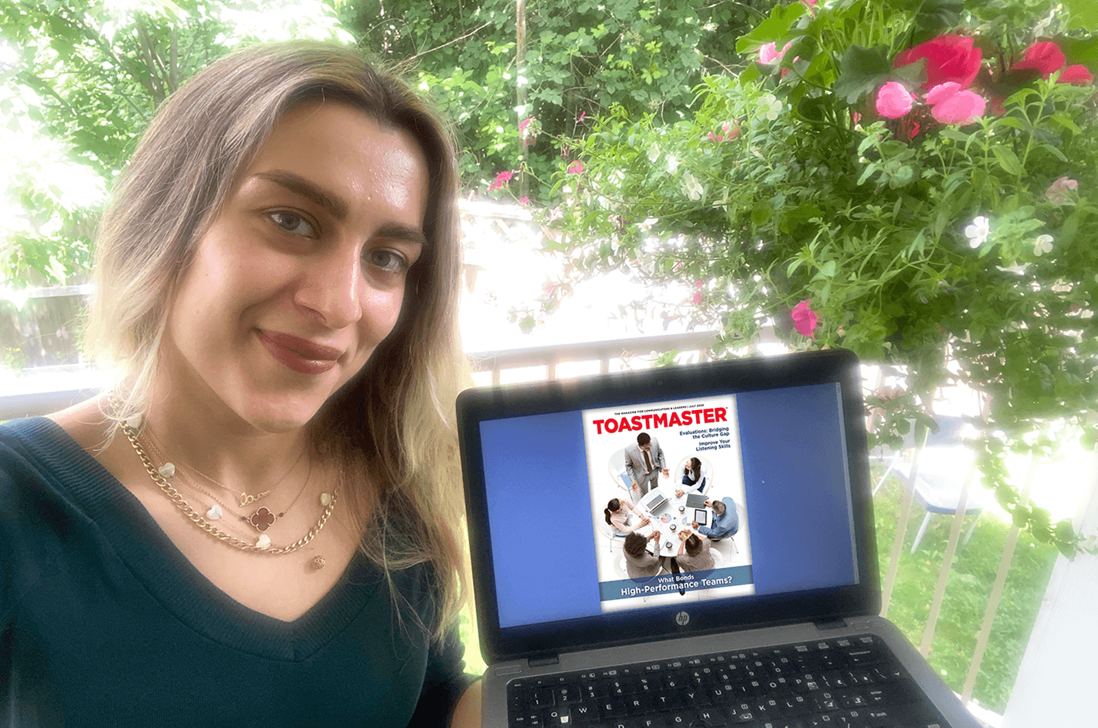 Elaheh Sharafian of Vancouver, British Columbia, Canada, enjoys a Sunday afternoon in quarantine with her online Toastmaster magazine.