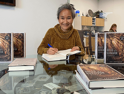 Woman signing book